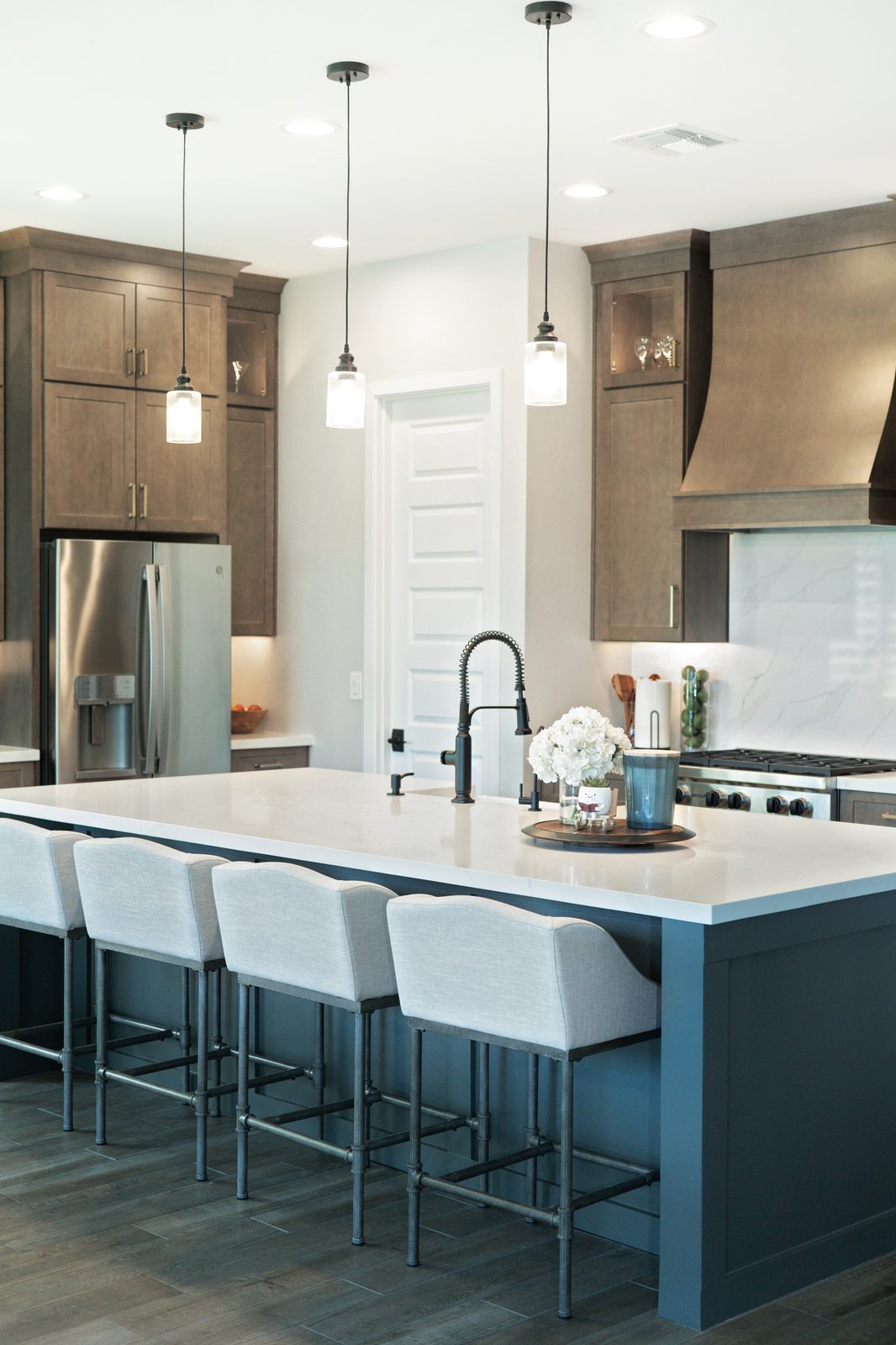 Full kitchen remodel with warm-stained semi-custom cabinetry and quartz countertops, Queen Creek, AZ