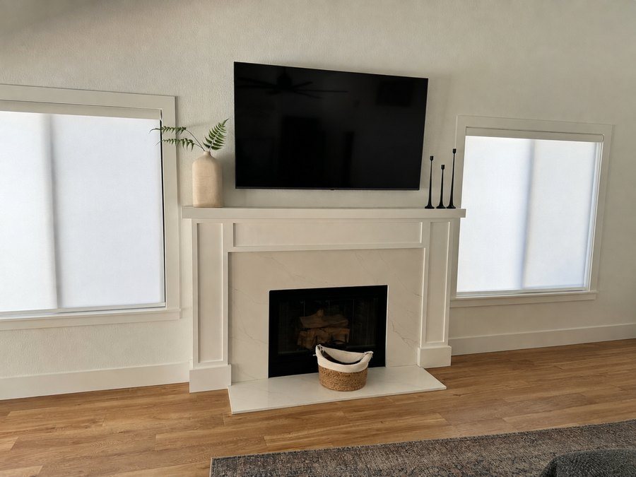 Full slab quartz fireplace surround and hearth in a Chandler, AZ living room