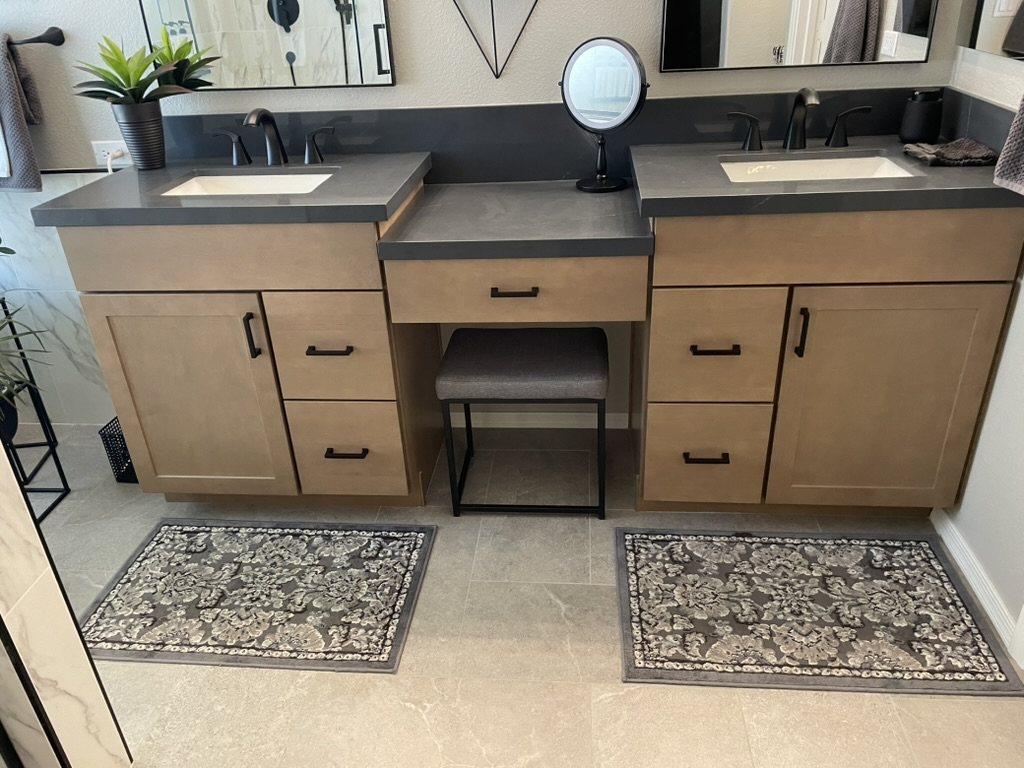 Charcoal quartz vanity tops with a full-length matching backsplash, Gilbert, AZ master bathroom
